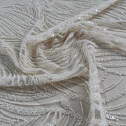 Pizzo Alta Moda perline e paillettes su tulle champagne Diffusione Tessuti Pizzo Alta Moda perline