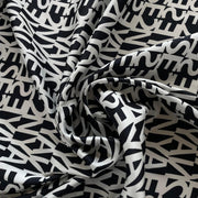 Crepe di Poliestere con Stampa Lettere Diffusione Tessuti Crepe di Poliestere con Stampa Lettere