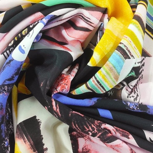 Crepe sintetico fantasia colori accesi - Diffusione Tessuti