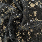 Pizzo di poliestere nero con Paillettes - Diffusione Tessuti
