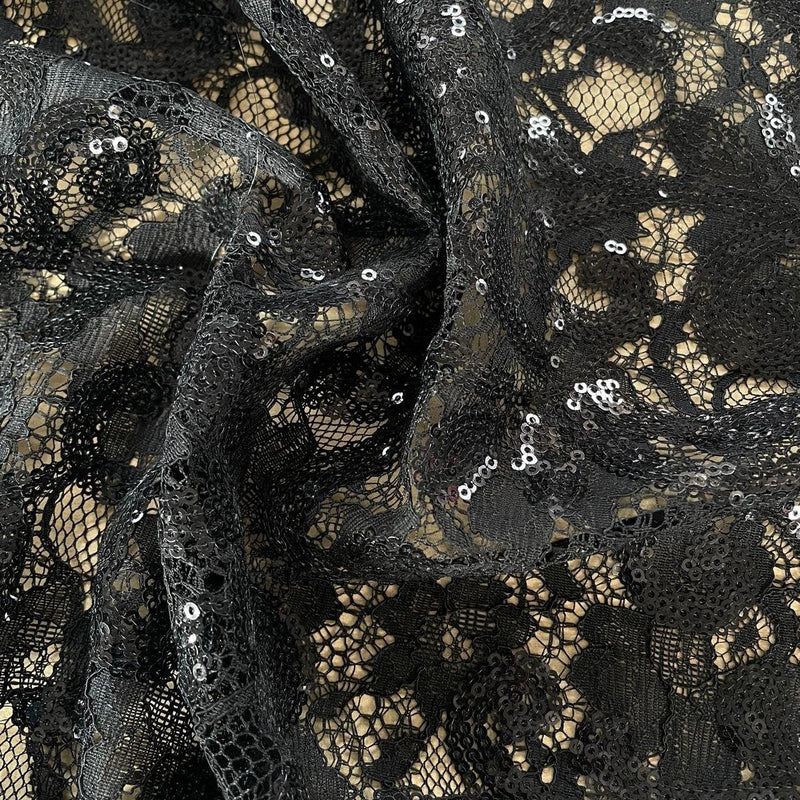 Pizzo di poliestere nero con Paillettes - Diffusione Tessuti