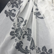 Tenda devoré barocca floreale in poliestere, con orlo piombato e altezza 300 cm, ideale per ambienti eleganti.