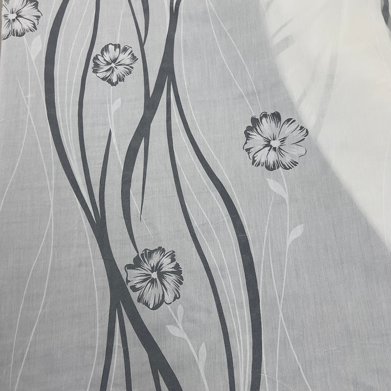 Tenda in poliestere devoré fantasia fiori e steli, altezza 300 cm, orlo piombato, disponibile in due varianti colore.