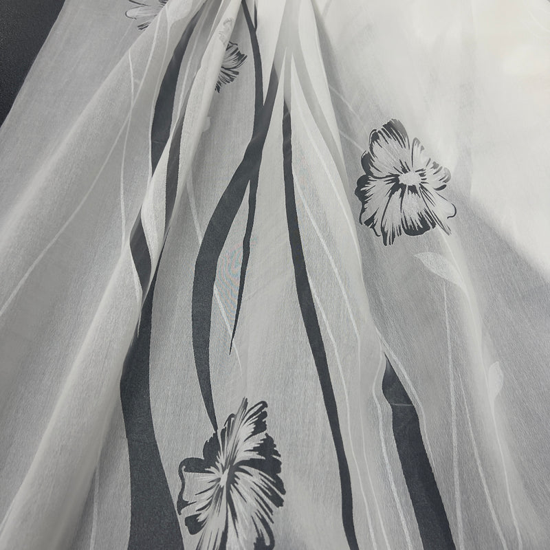 Tenda in poliestere devoré fantasia fiori e steli, altezza 300 cm, orlo piombato, disponibile in due varianti colore.