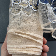 Tulle con fiori di ciliegio ricamato - Diffusione Tessuti